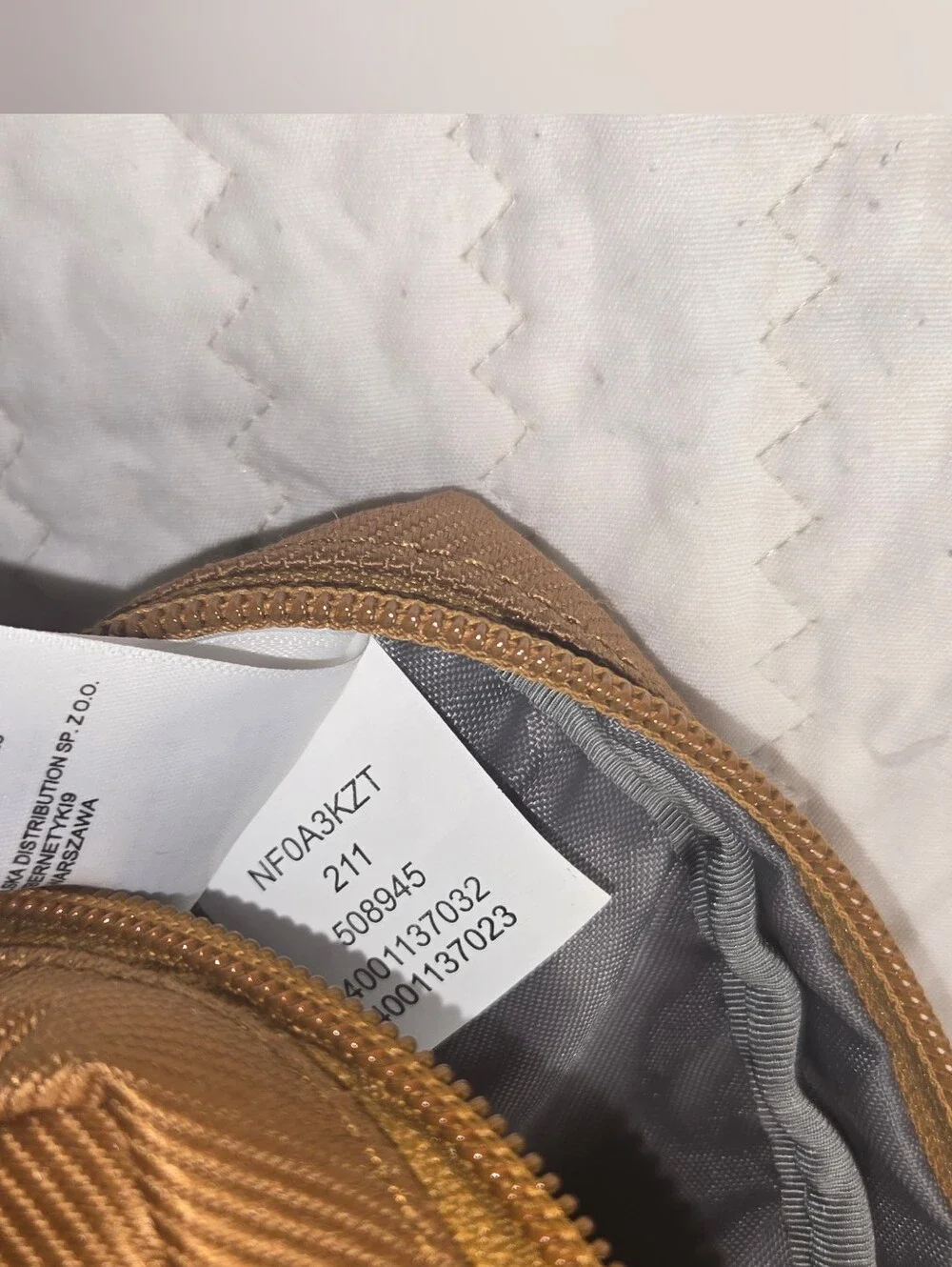The North Face compact mustard